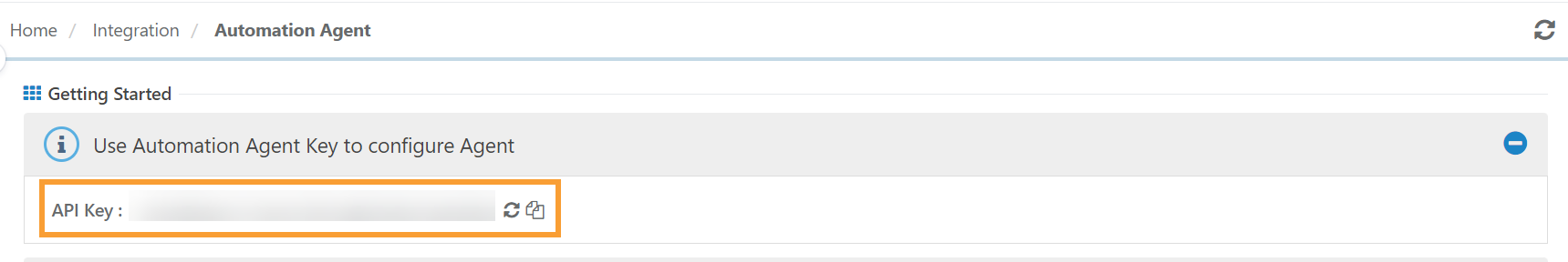Screenshot showing the Automation Agent API Key field in QMetry with options to regenerate or copy the key.
